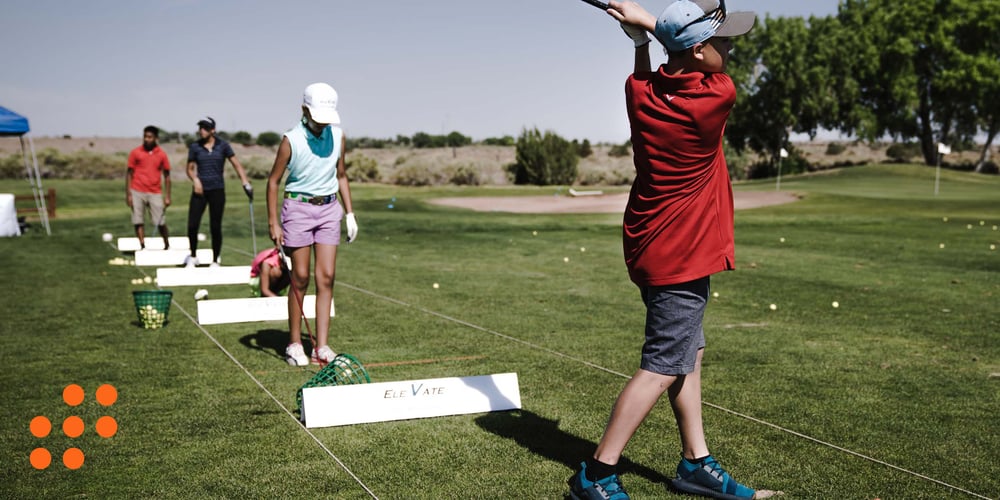 golf driving range with kids